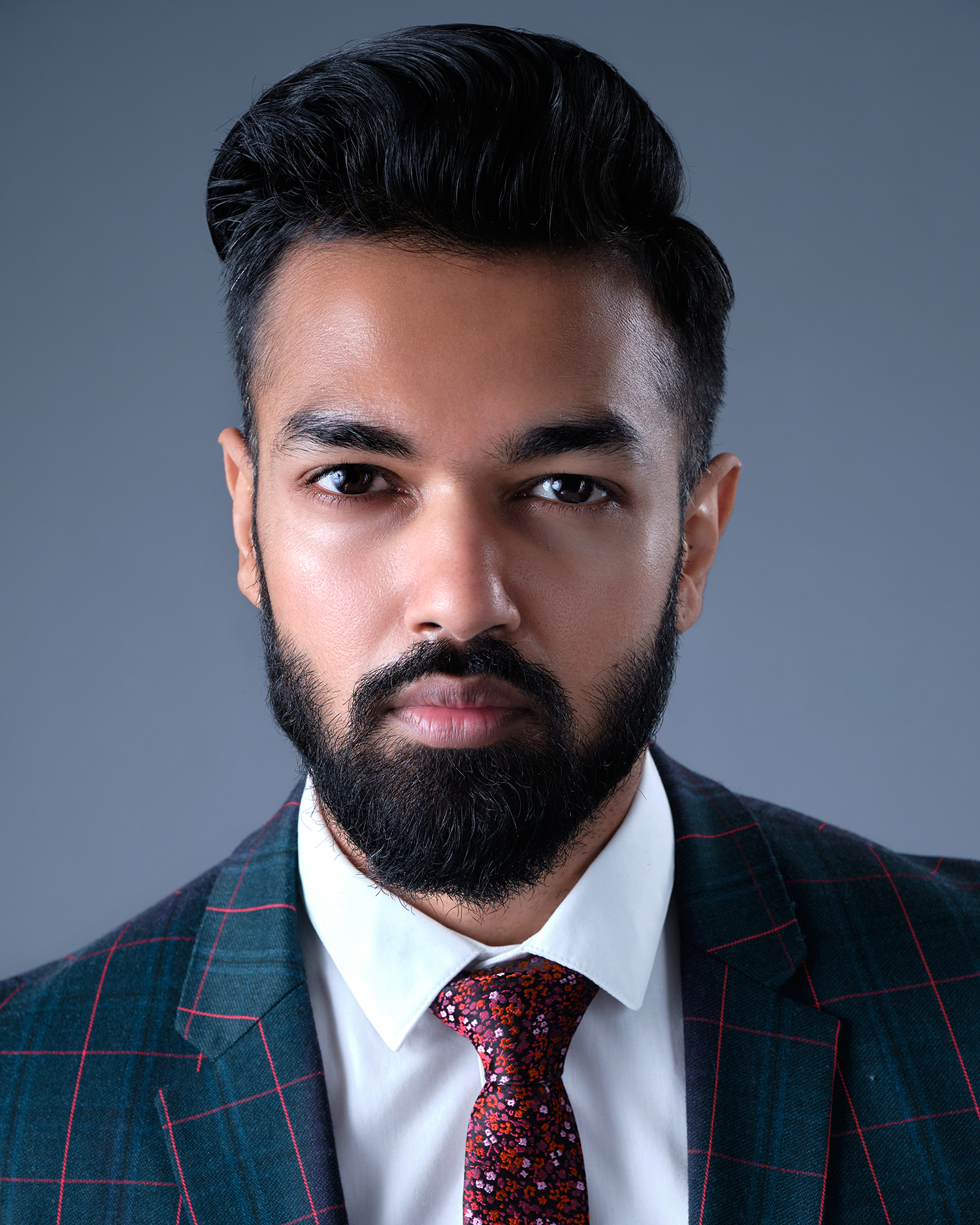 indian guy in suit