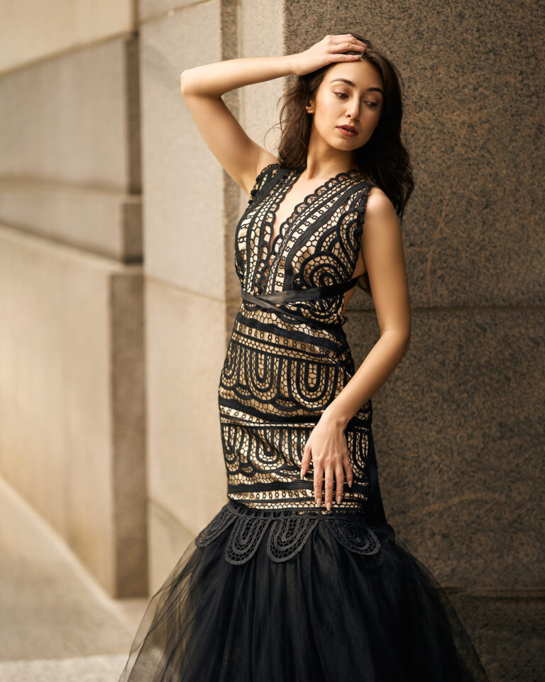 Model wearing black dress in the city photoshoot